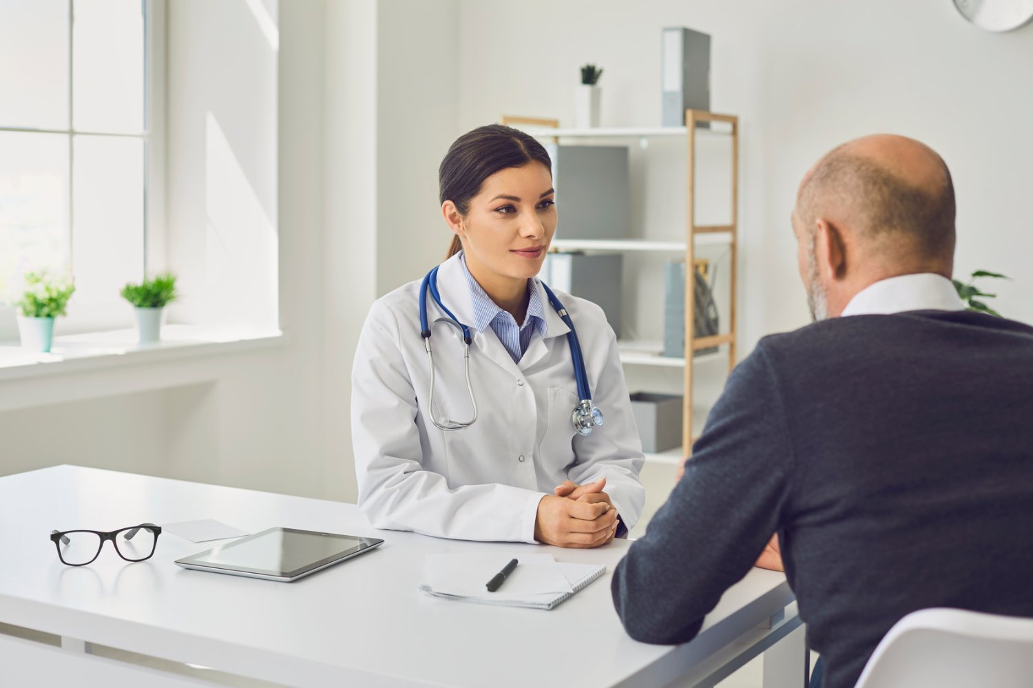 Doctor reviewing exam results with a patient